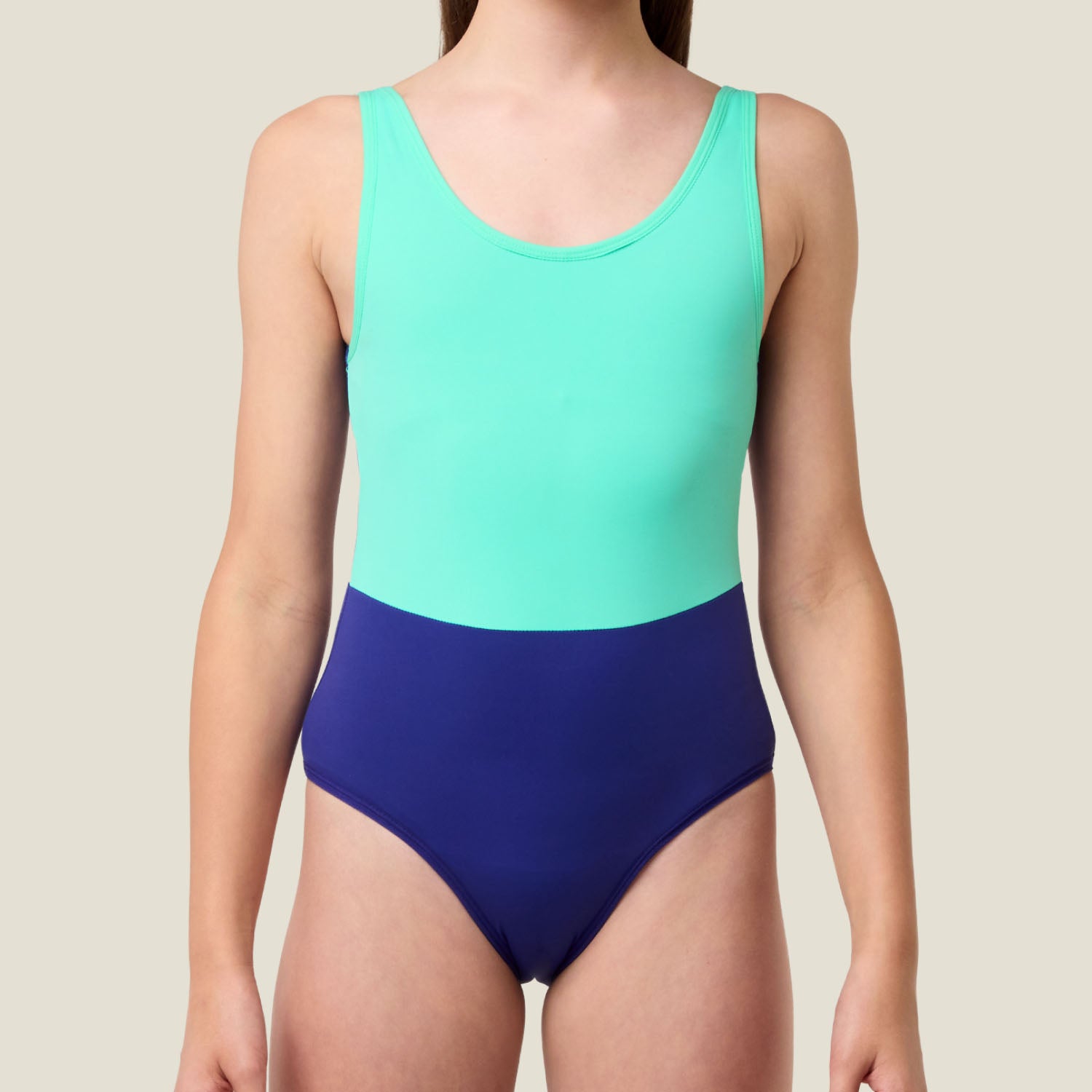 Front view of WUKA Teen Period Scoopback Swimsuit in Green and Blue, designed for medium flow period protection with a sporty and secure fit.