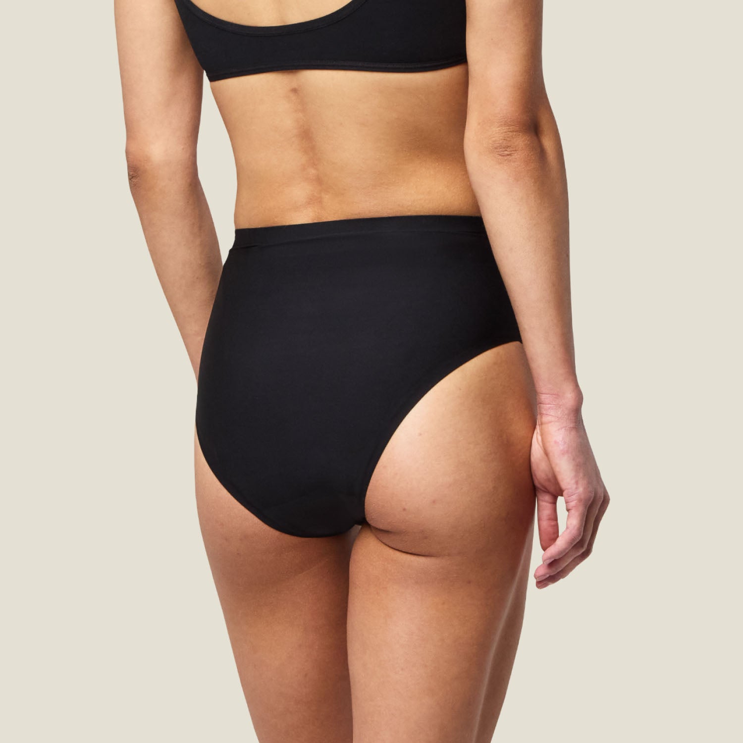 Rear view of WUKA Stretch™ Period Underwear in black, showing full coverage and smooth finish for sleep comfort.
