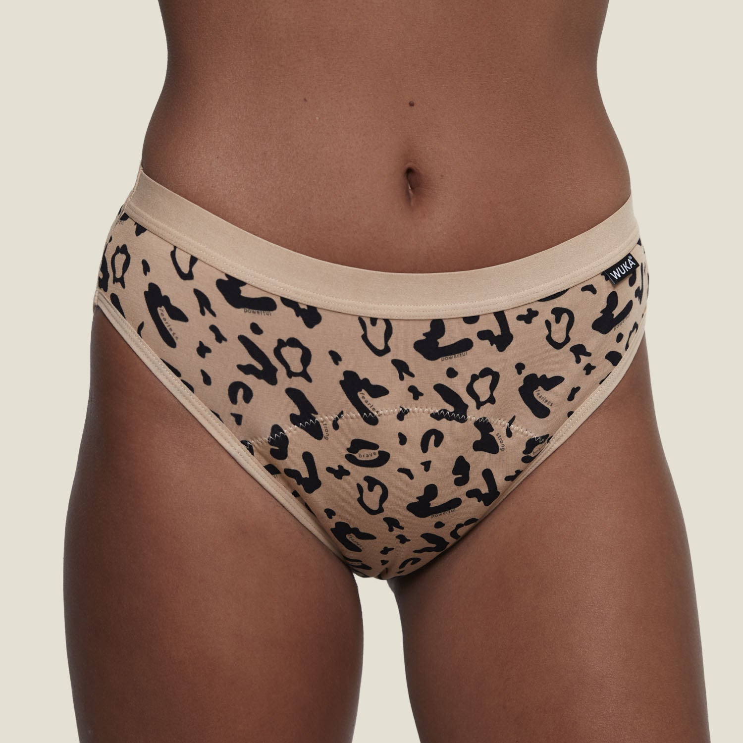 Front close-up of WUKA Basics™ Leopard Print Bikini heavy flow period pants, featuring bold leopard print and breathable, absorbent fabric