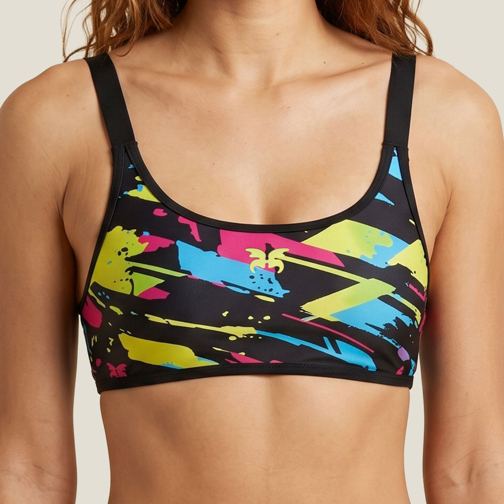 Teen swimmer wearing the WUKA Lunafly Competition Bikini top, front view — period swim co-ord top